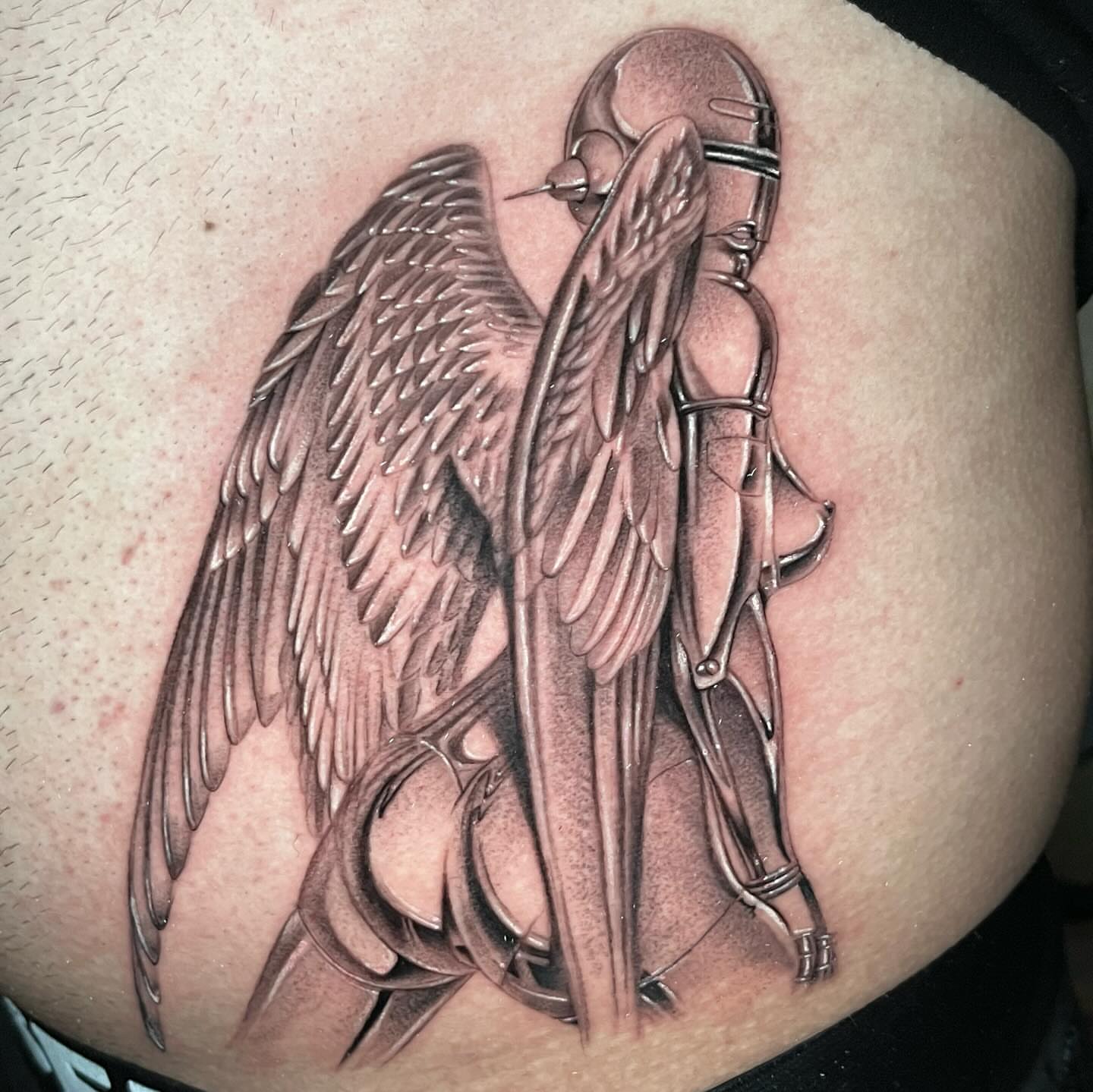Angel with scissors realism tattoo on the thigh by Single Needle ๐ชฉ