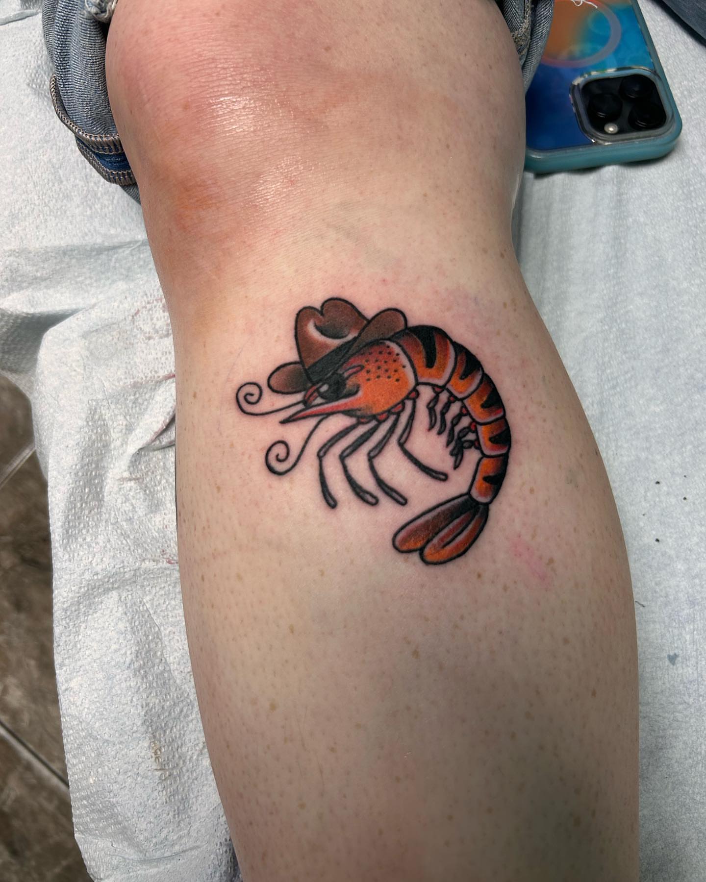Lobster wearing cowboy hat American traditional tattoo on the forearm by Ares Rhodes