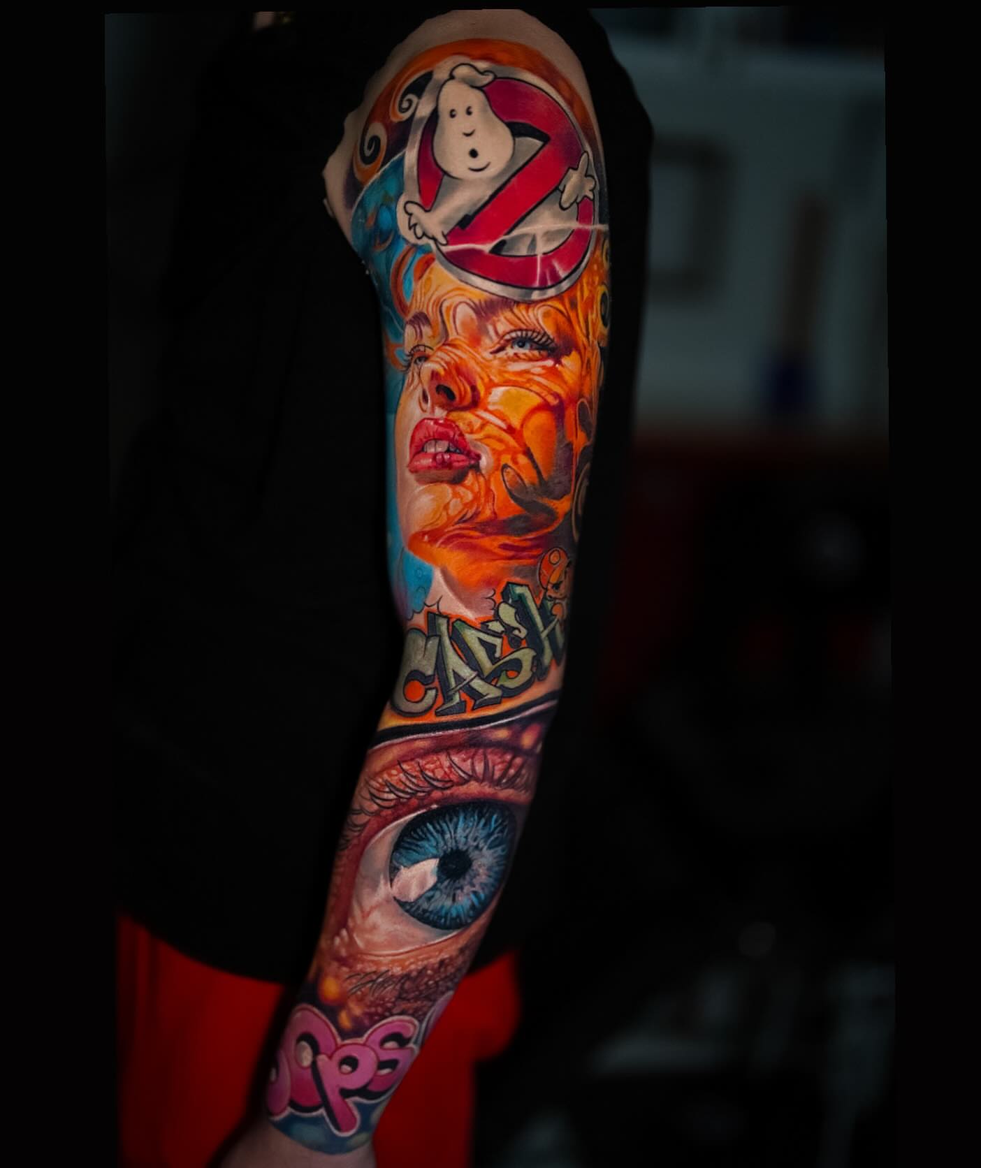 Ghostbusters logo and woman's face realism tattoo on the forearm by π¨π»βπ¨Ever luis Rivero π¨π»βπ¨