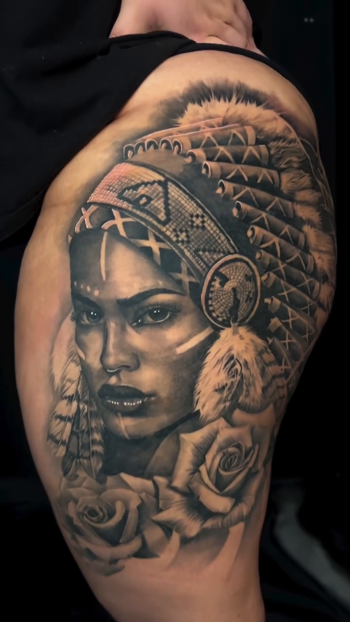 Native American woman with headdress realism tattoo by Brayan Molina