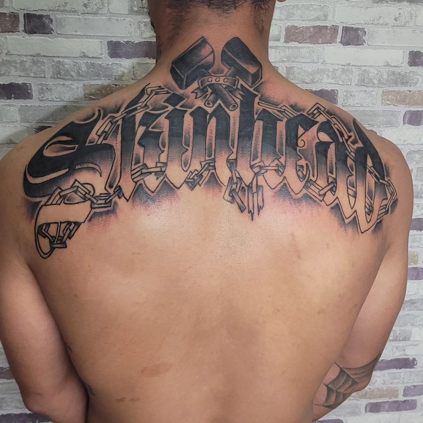 Script lettering lettering script tattoo on the back by Gonzalo Pantona