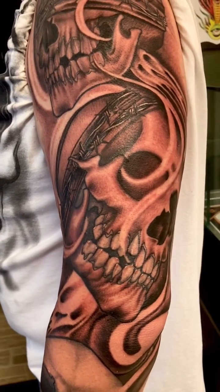 Tattoo by @dorroughtattooer — dark_realism, black_and_grey