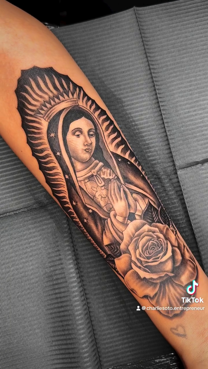 Virgin Mary and rose realism tattoo by Charlie Soto