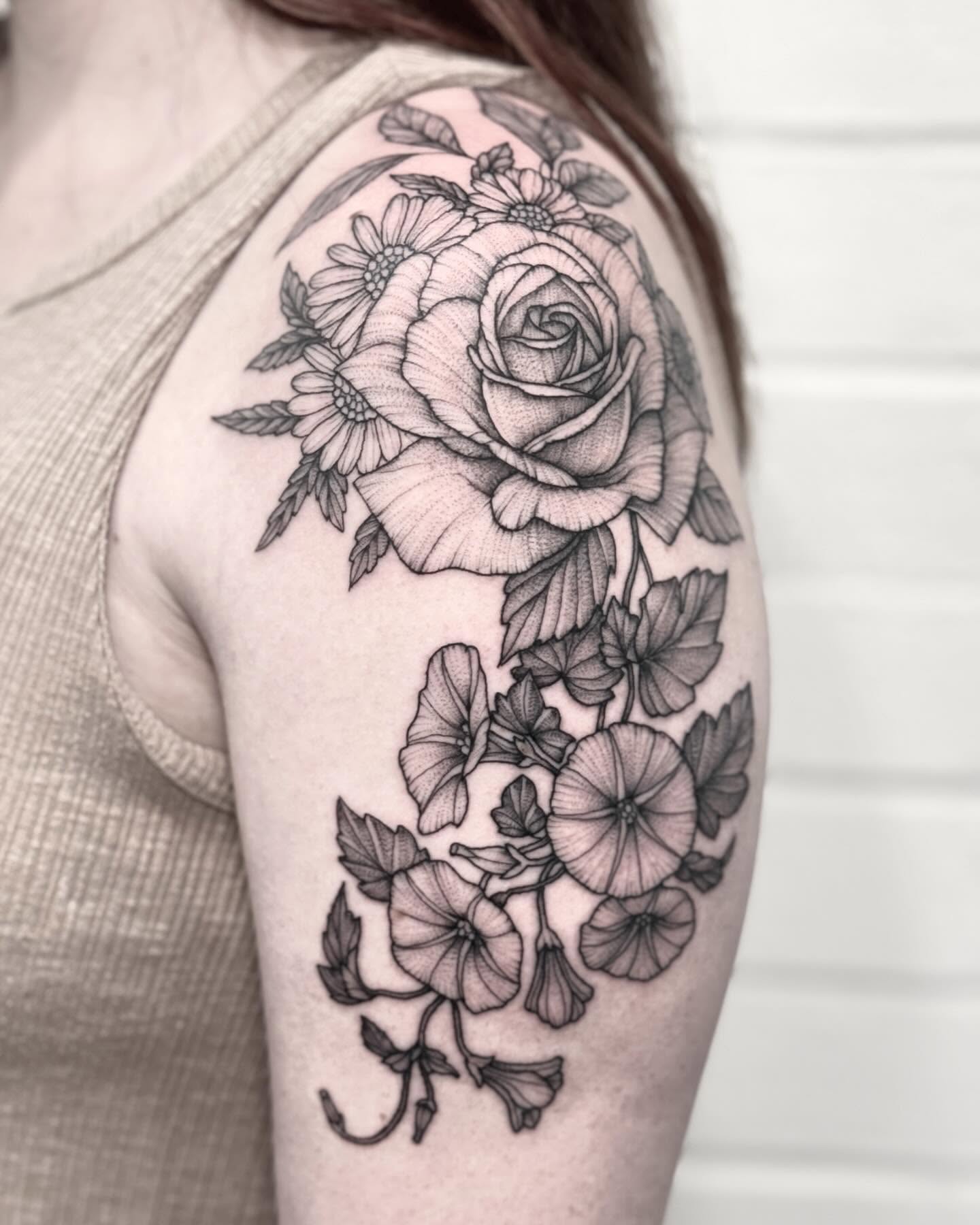 Floral bouquet realism tattoo on the shoulder by Alex Shakuto Tattoo