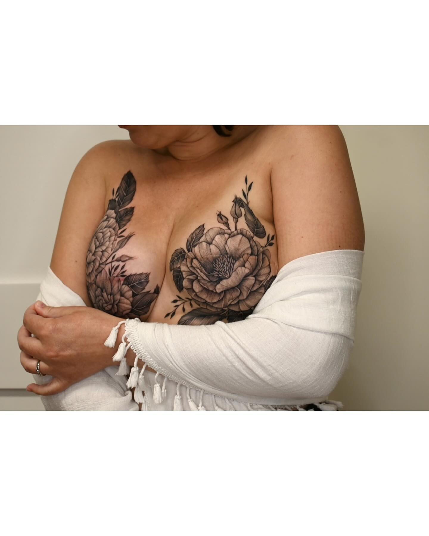 Floral bouquet black and grey tattoo on the chest by ๐
๐๐๐๐๐ ๐๐๐๐๐๐