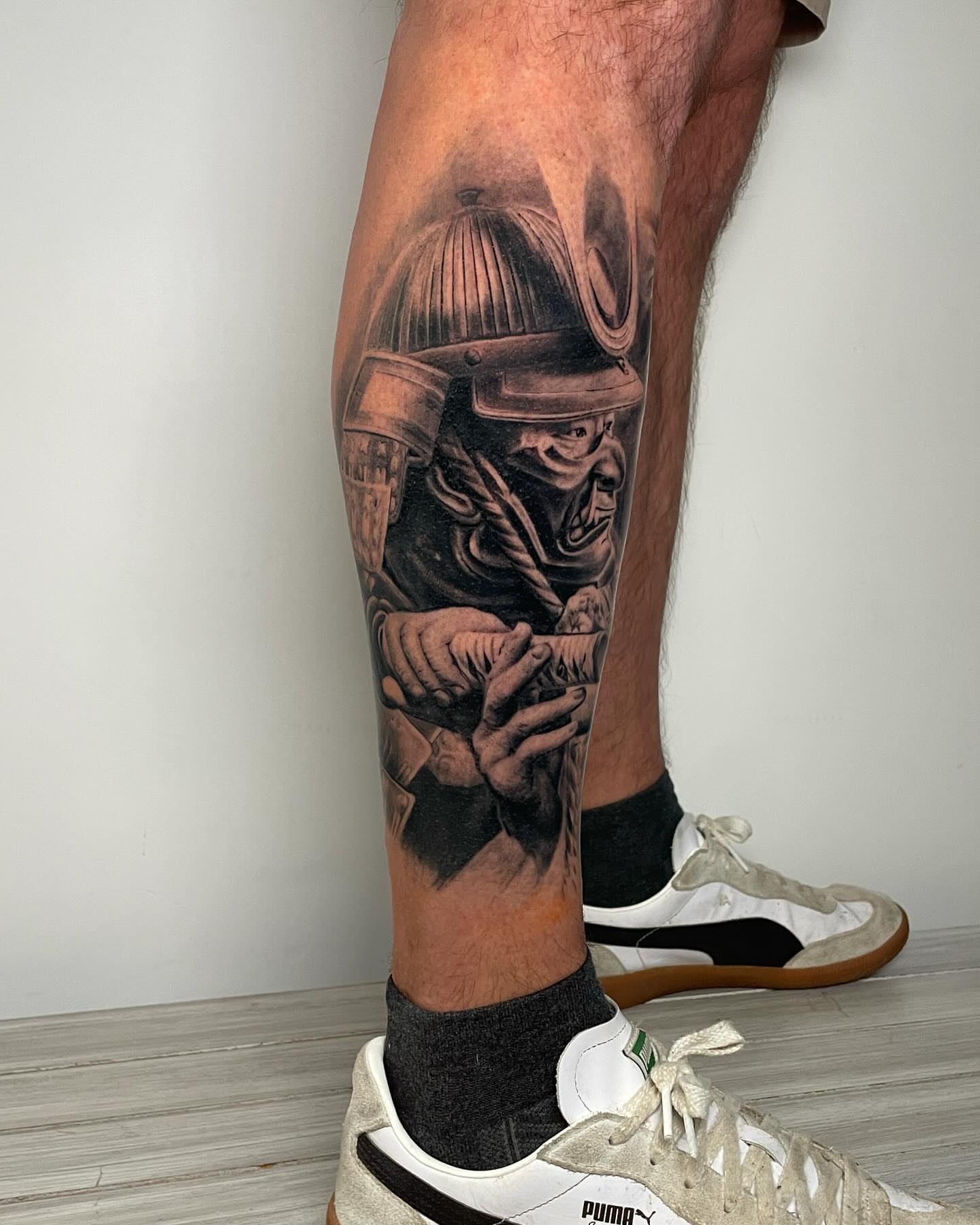 Firefighter realism tattoo on the calf by Justin Reid, San Jose, California