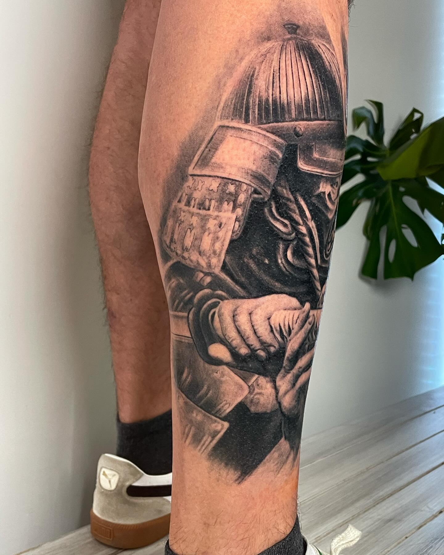 Welder realism tattoo on the calf by Justin Reid, San Jose, California