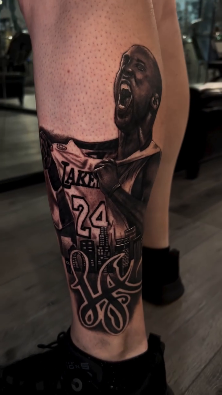 Kobe bryant portrait and basketball jersey realism tattoo by Rafa