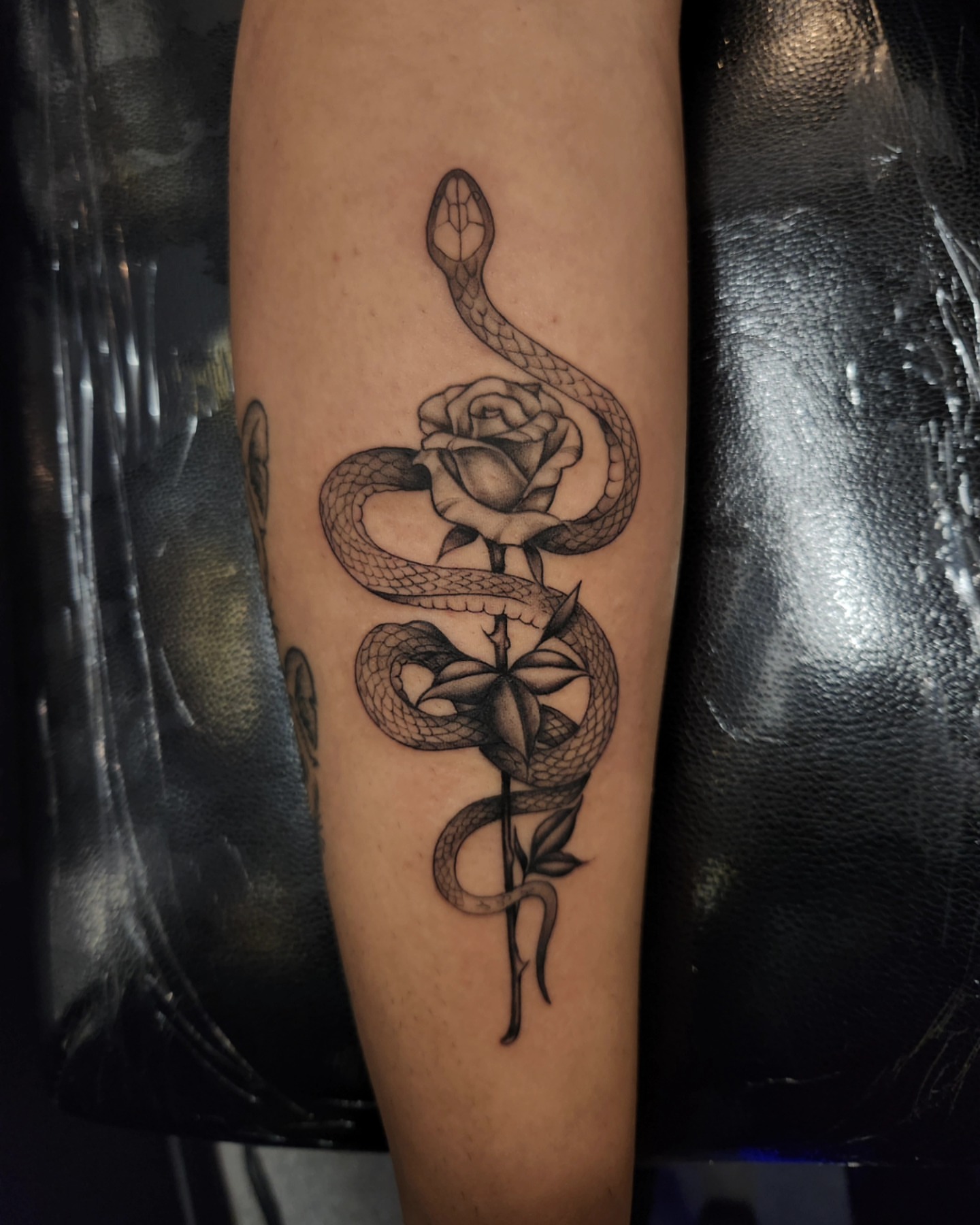 Tattoo by @stone_man720 — black_and_grey, realism