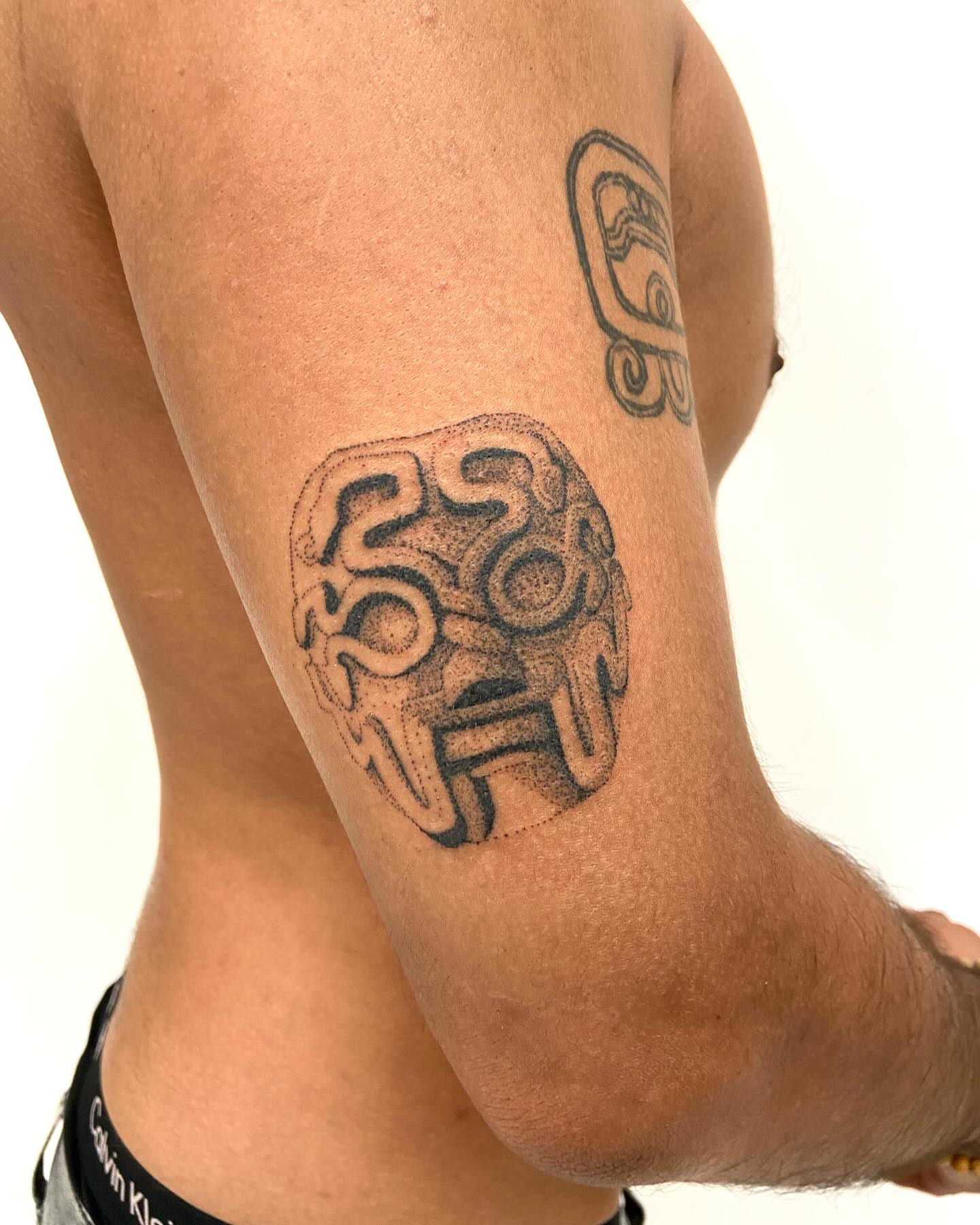 Ancient mask dotwork tattoo on the forearm by ∘≁≀Gæish∀ ⍕ ◯⊂ⅇl⌾tl≀≁∘