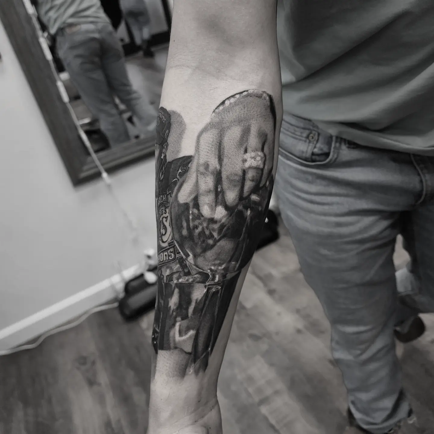Hand with ring realism tattoo on the forearm by Dani Ryan