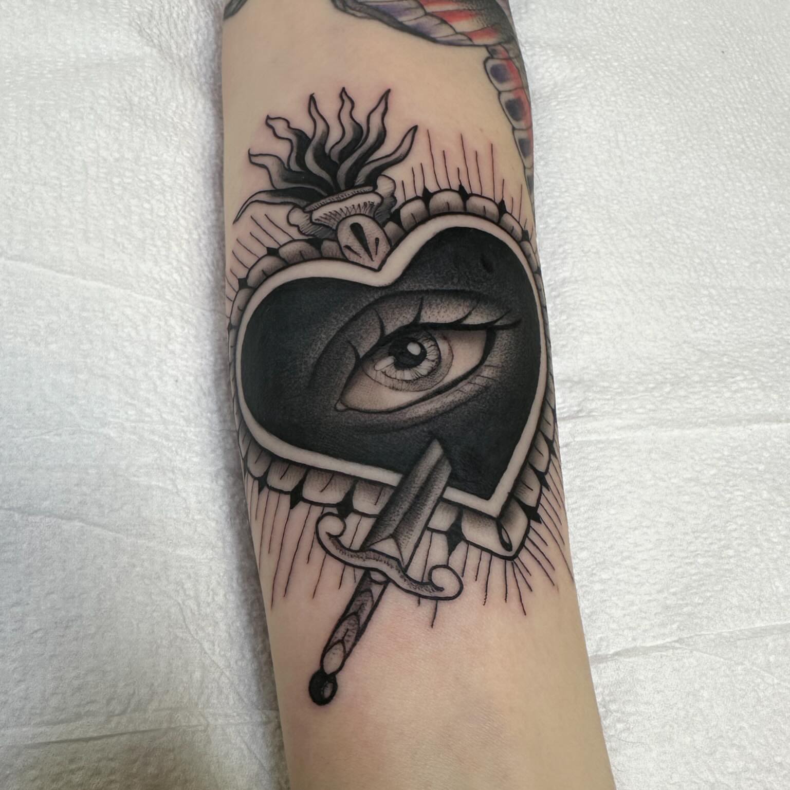 Eye with wings American traditional tattoo on the forearm by Juan Vega (tony)