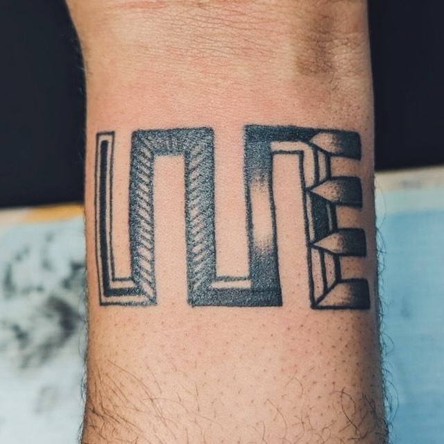 Geometric geometric tattoo on the forearm by Tiffany