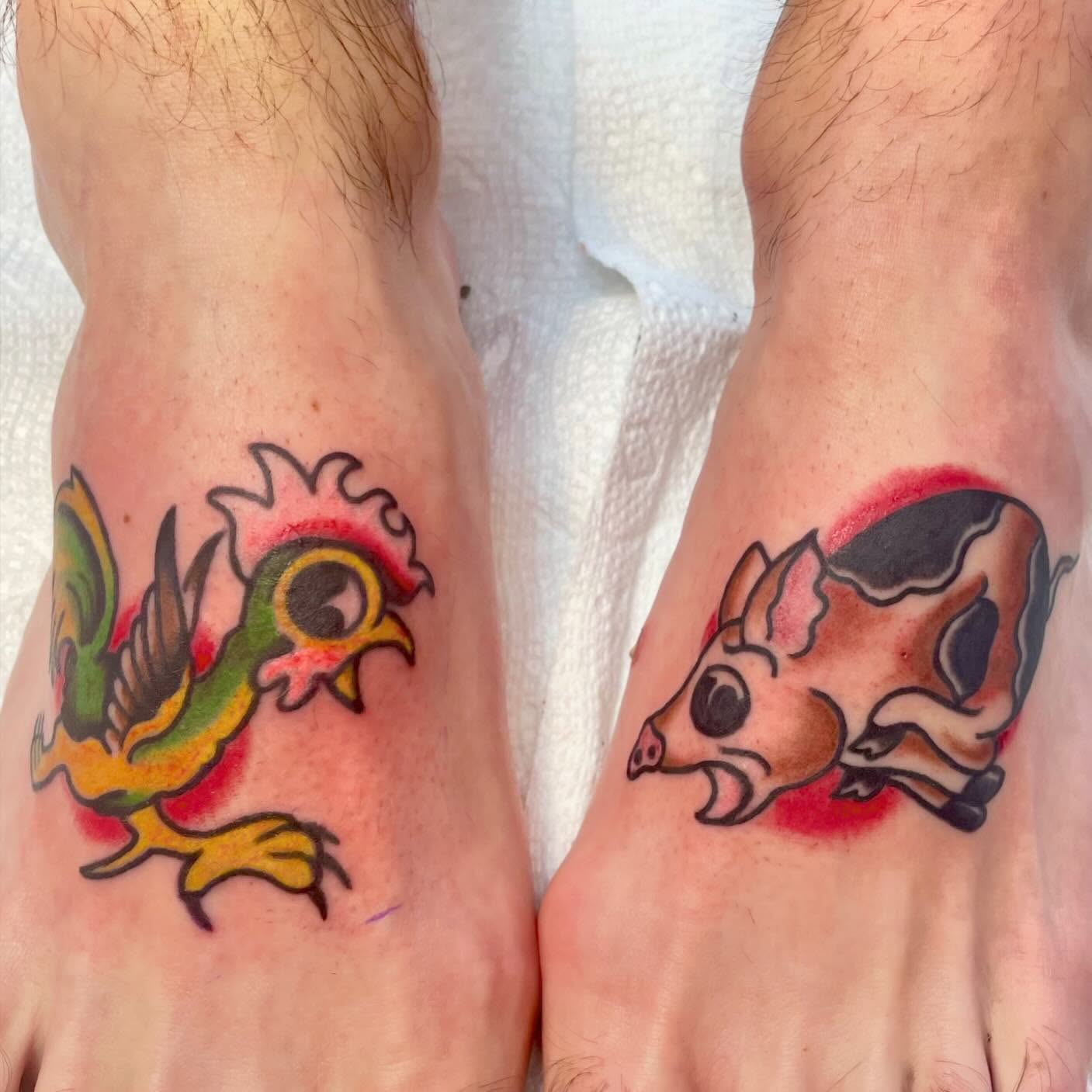 Rooster and pig American traditional tattoo on the foot by Seth Griffin