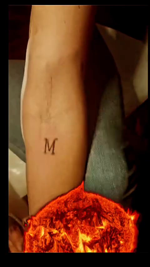 Single letter 'M' tattoo tattoo on the forearm by Tatuadora & Piercer