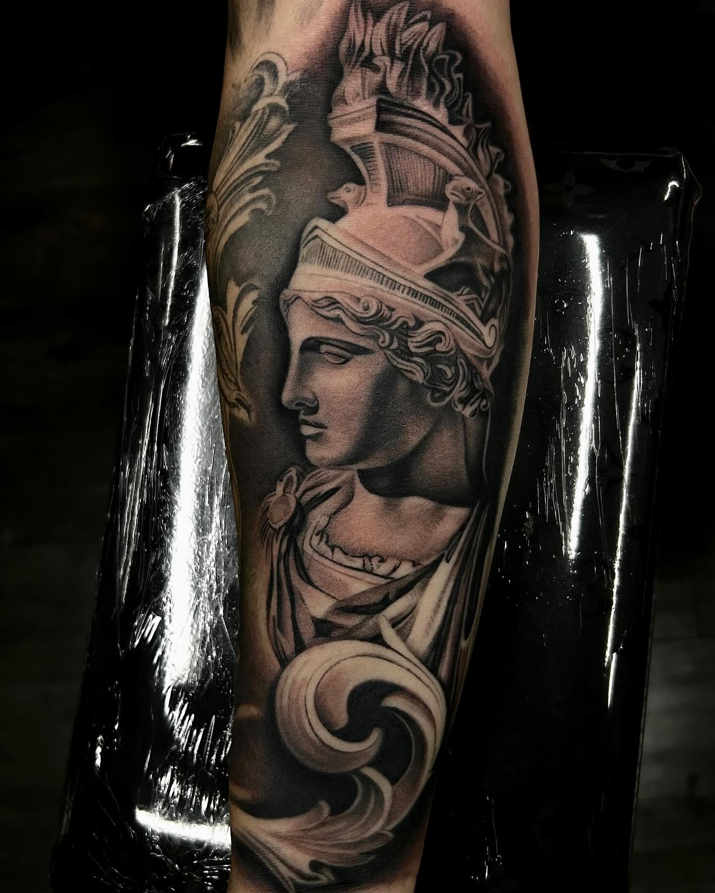 Statue bust realism tattoo on the forearm by Jayden A
