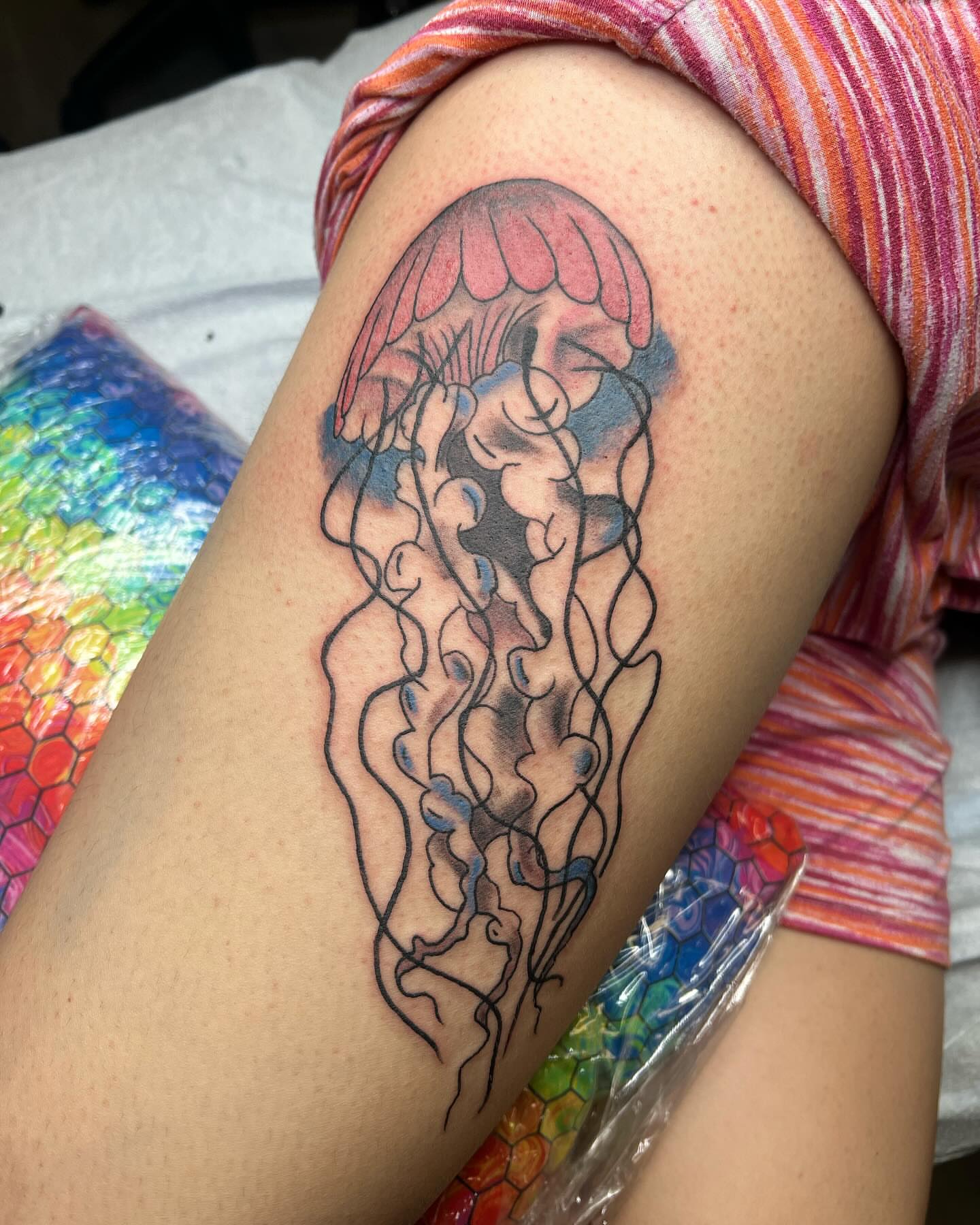 Jellyfish watercolor tattoo on the thigh by Kai