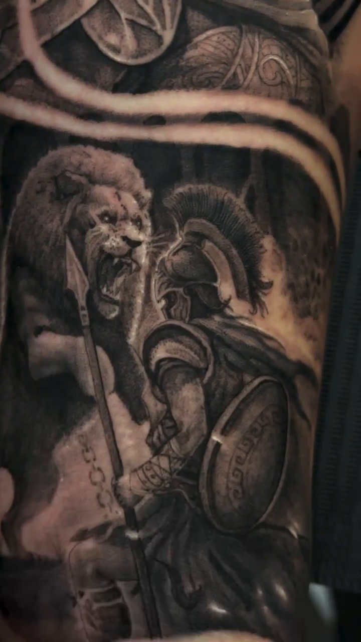 Spartan warriors and lion realism tattoo by Michael Tovar