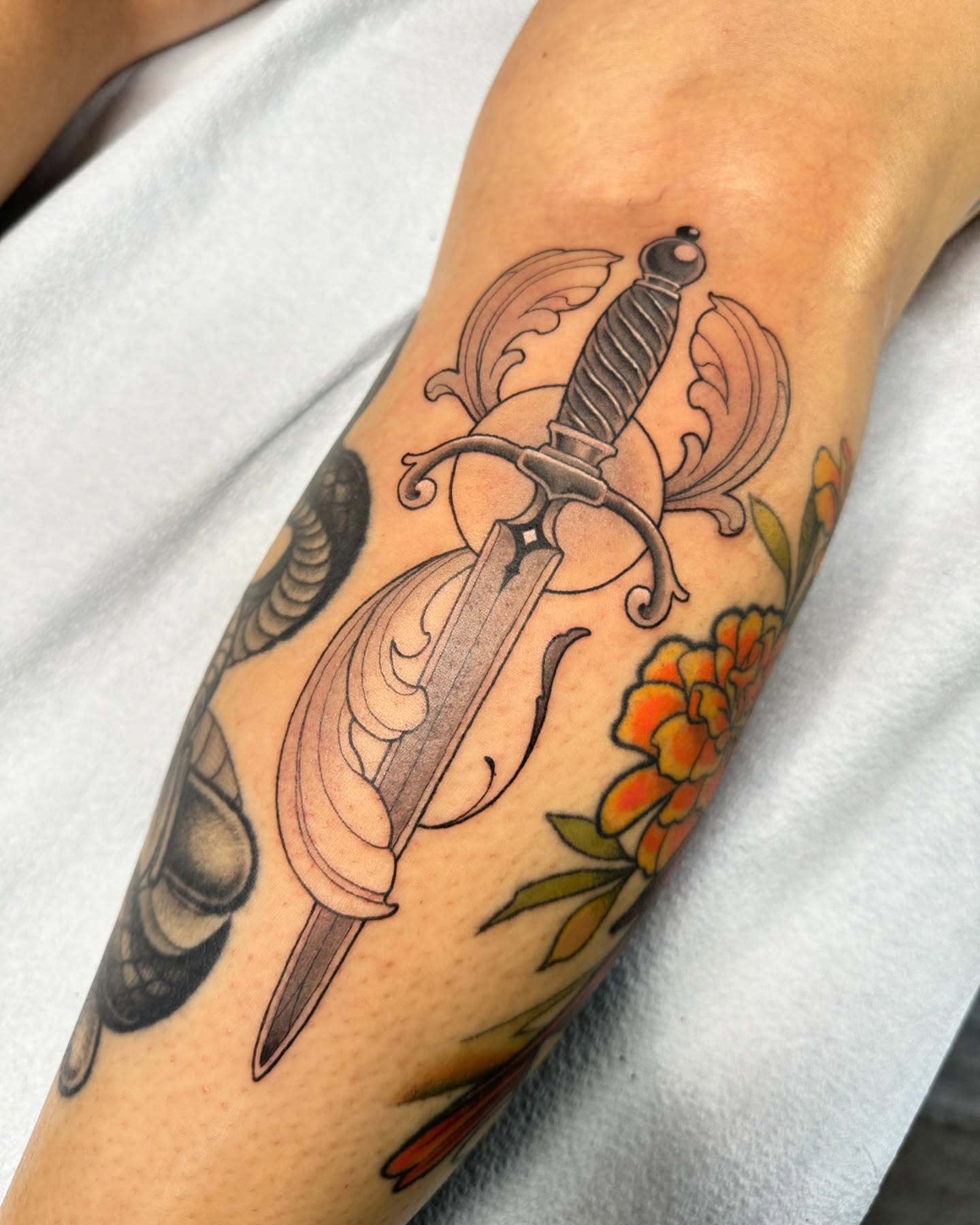 Tattoo by @julioferrerart — american_traditional, ornamental