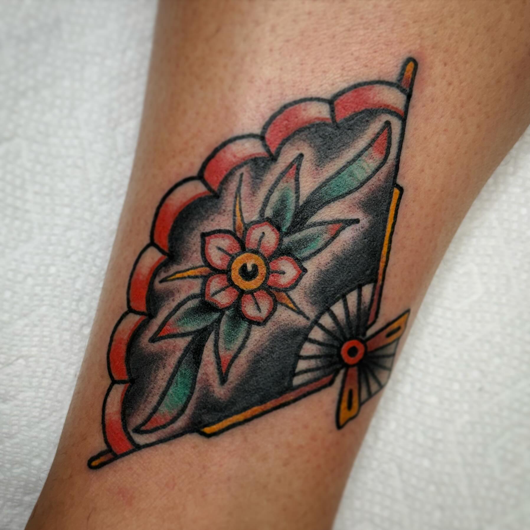 Flower cart American traditional tattoo on the forearm by Drew McElveney, Austin, Texas