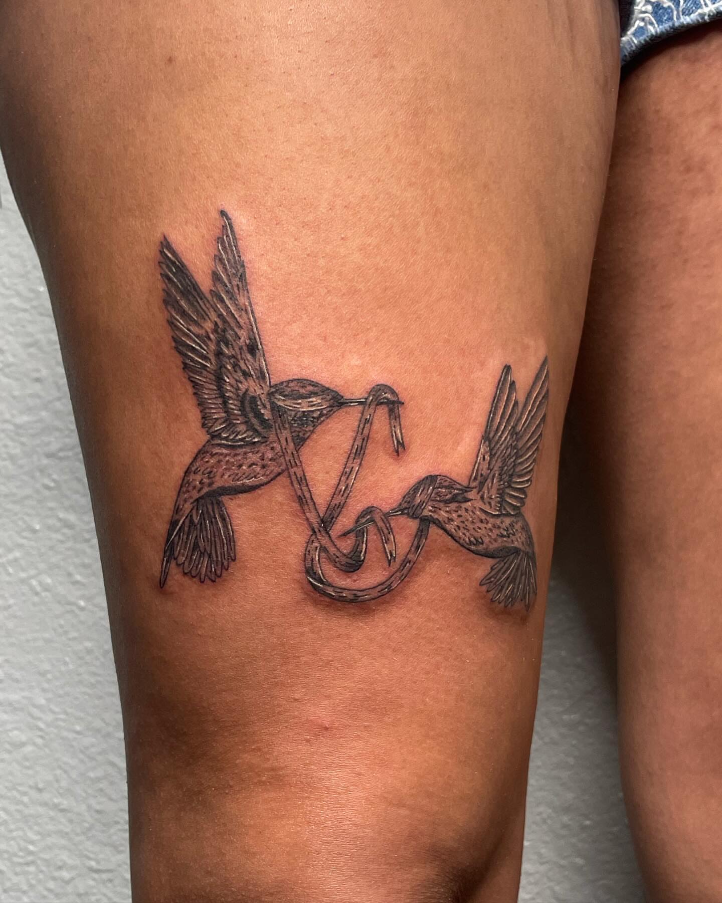 Hummingbirds black and grey tattoo on the thigh by Las Vegas Tattoo Artist