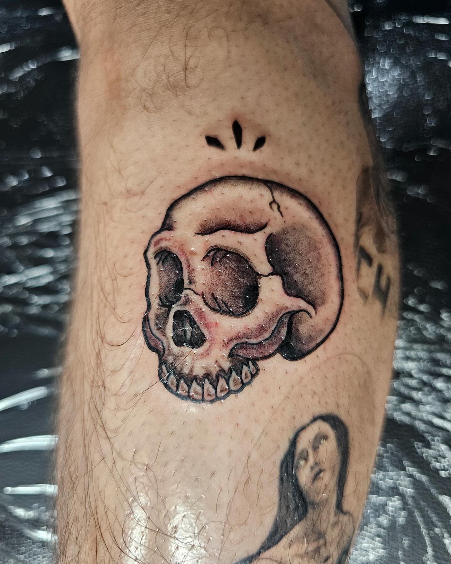 Skull realism tattoo on the forearm by J. Arturo Laparra