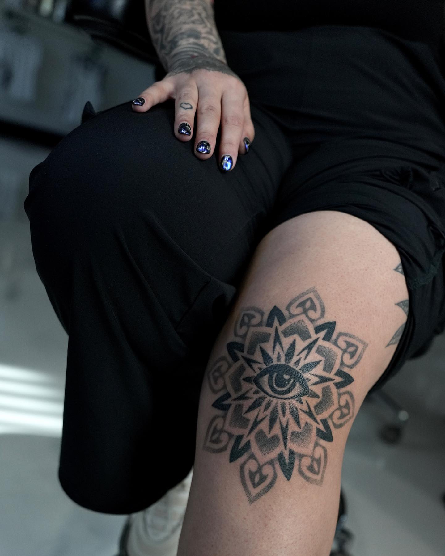 Eye and floral mandala geometric tattoo on the thigh by ⓝⓐⓘⓡⓐⓓⓞⓣⓢ