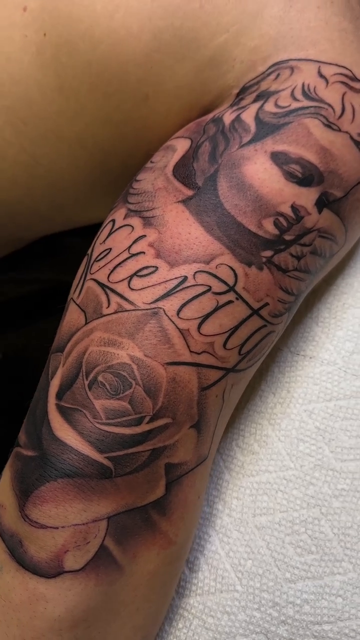 Tattoo by @chris_tattoo87 β realism, black_and_grey