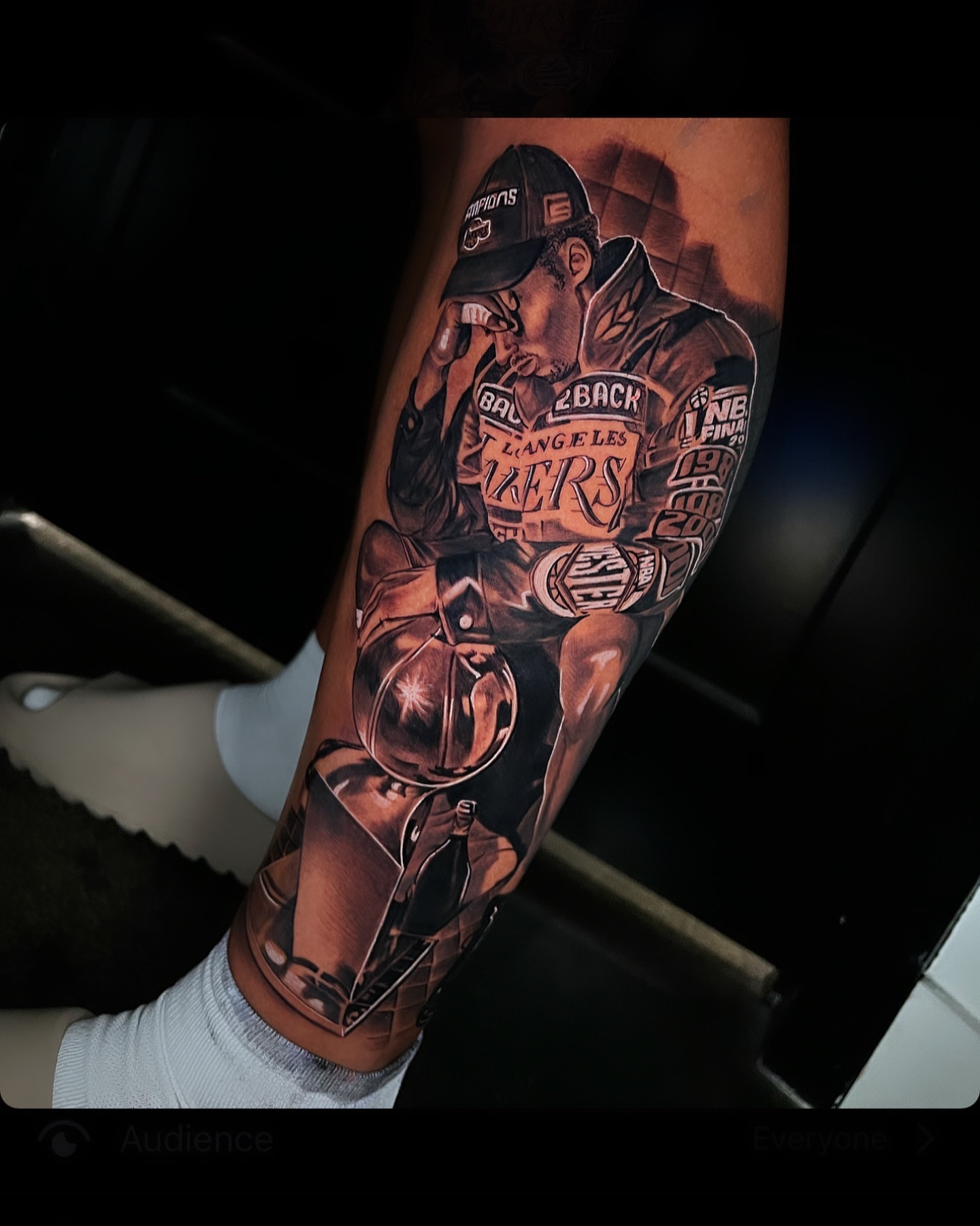 Basketball player realism tattoo on the forearm by Angel Lizarraga