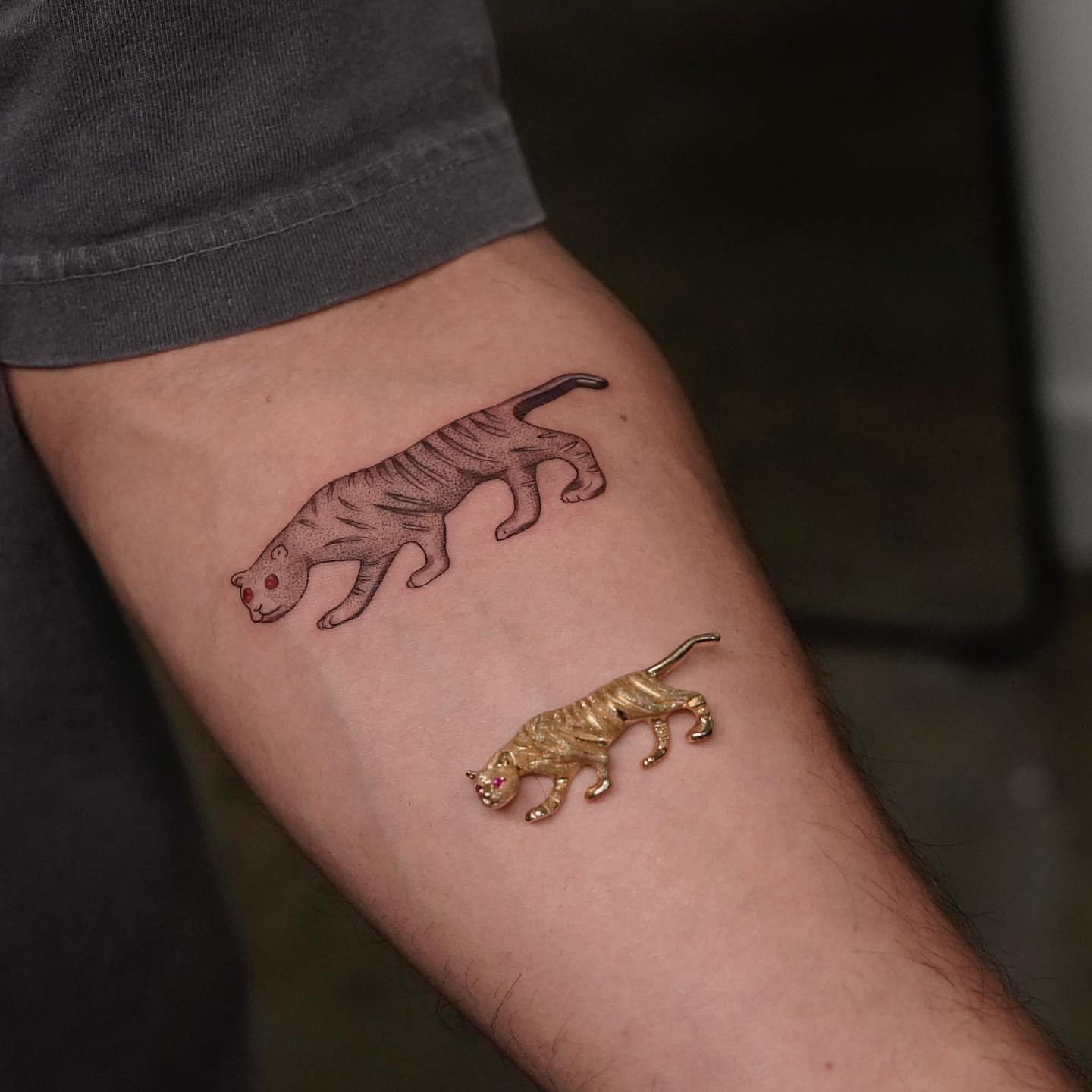 Tiger realism tattoo on the forearm by eddie chavez