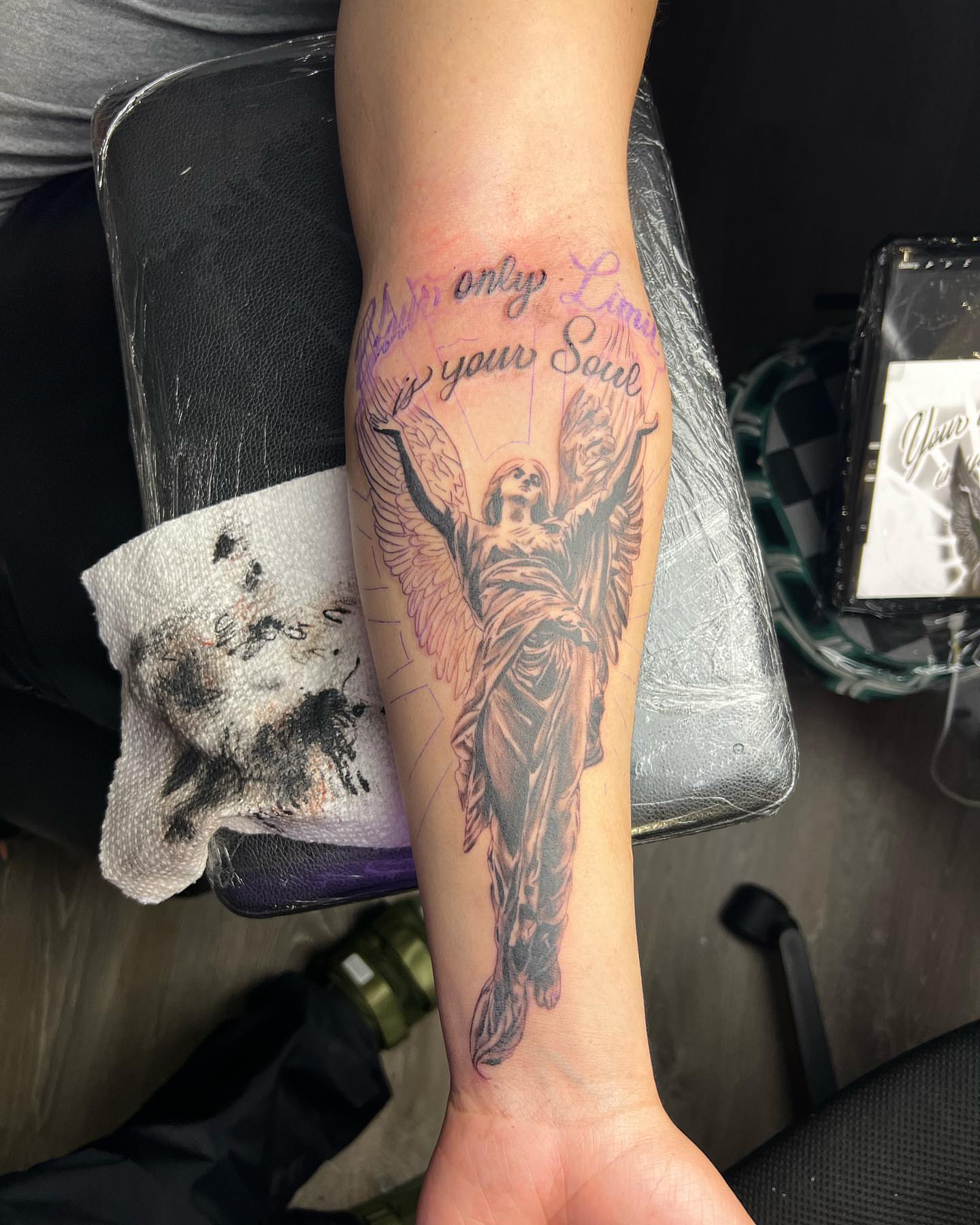 Angel neo-traditional tattoo on the forearm by Eduardo Chaparro