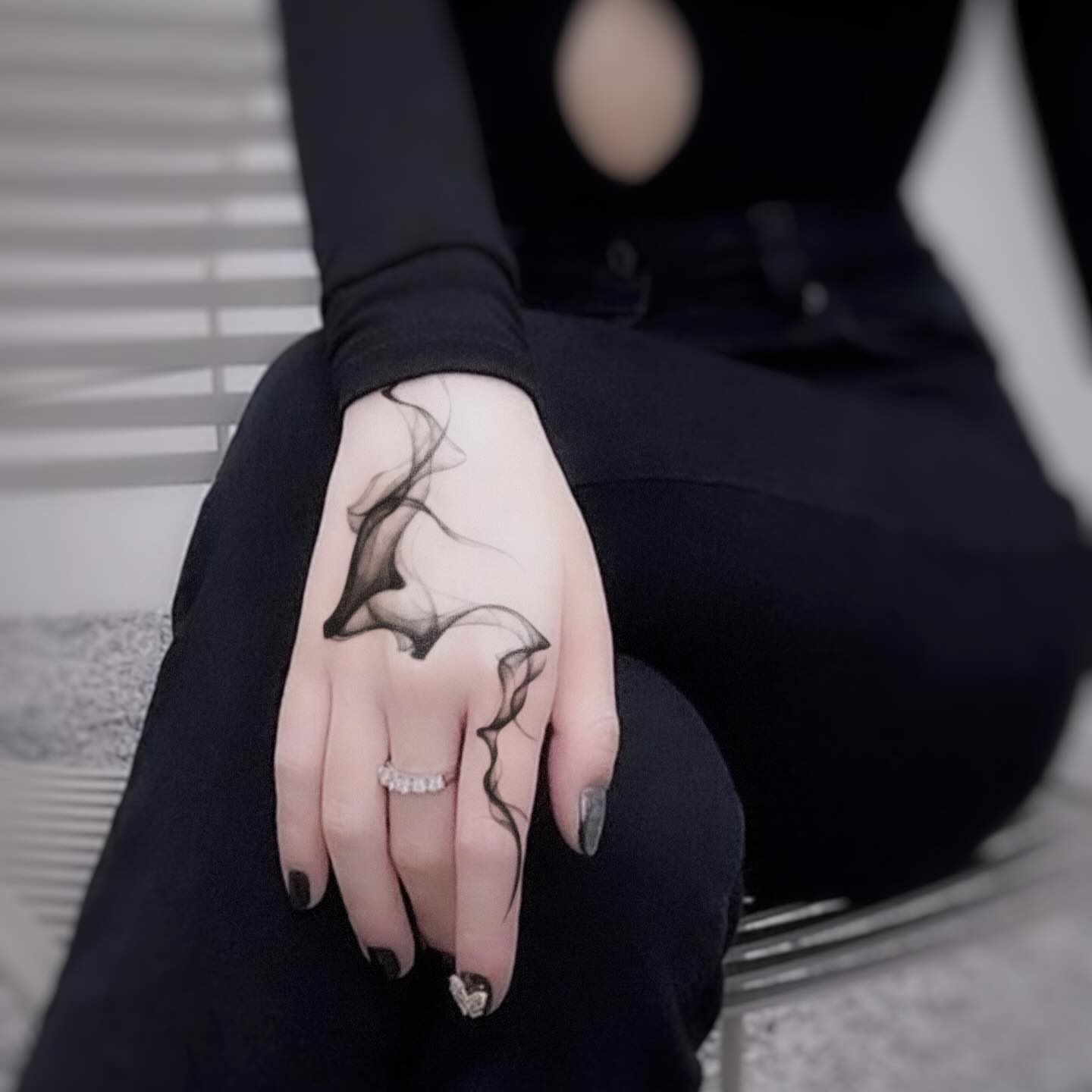 Smoke black and grey tattoo on the hand by Banky