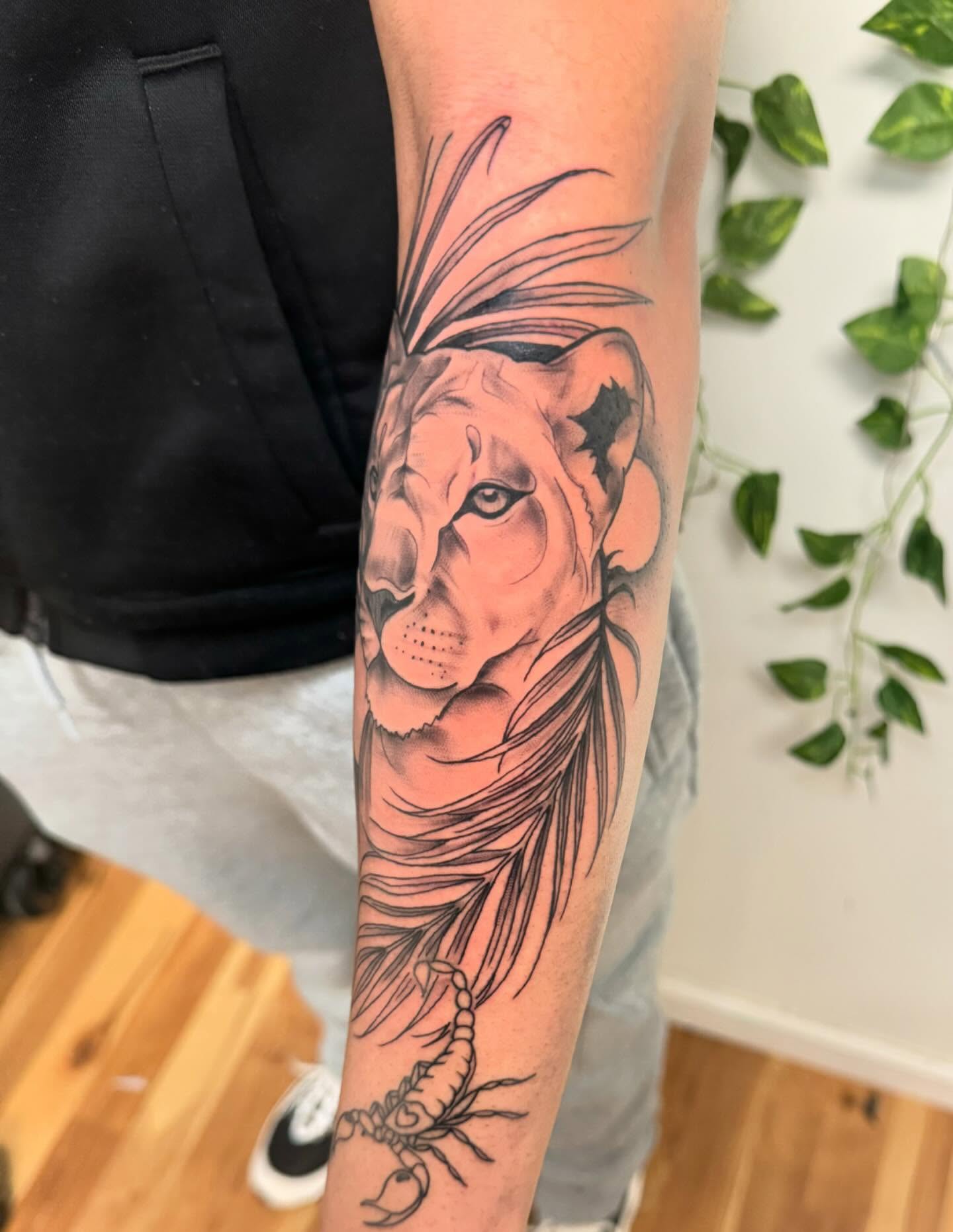 Lion and scorpion realism tattoo on the forearm by Breanna💉🔮, Dover, Delaware