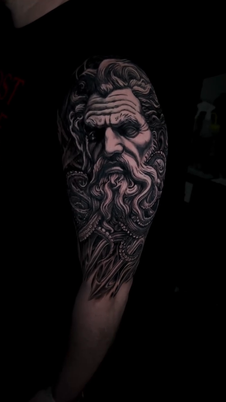 Bearded man and tentacles realism tattoo by Cory James