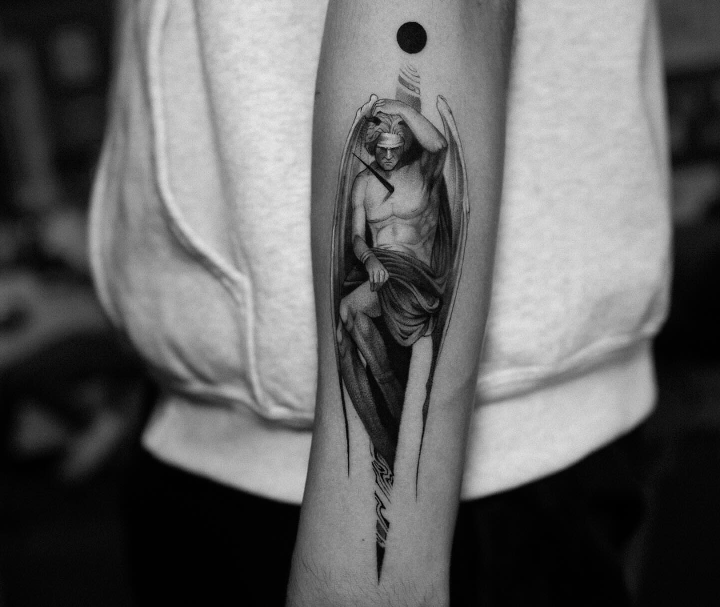 Angelic figure realism tattoo on the forearm by Lejo bravo