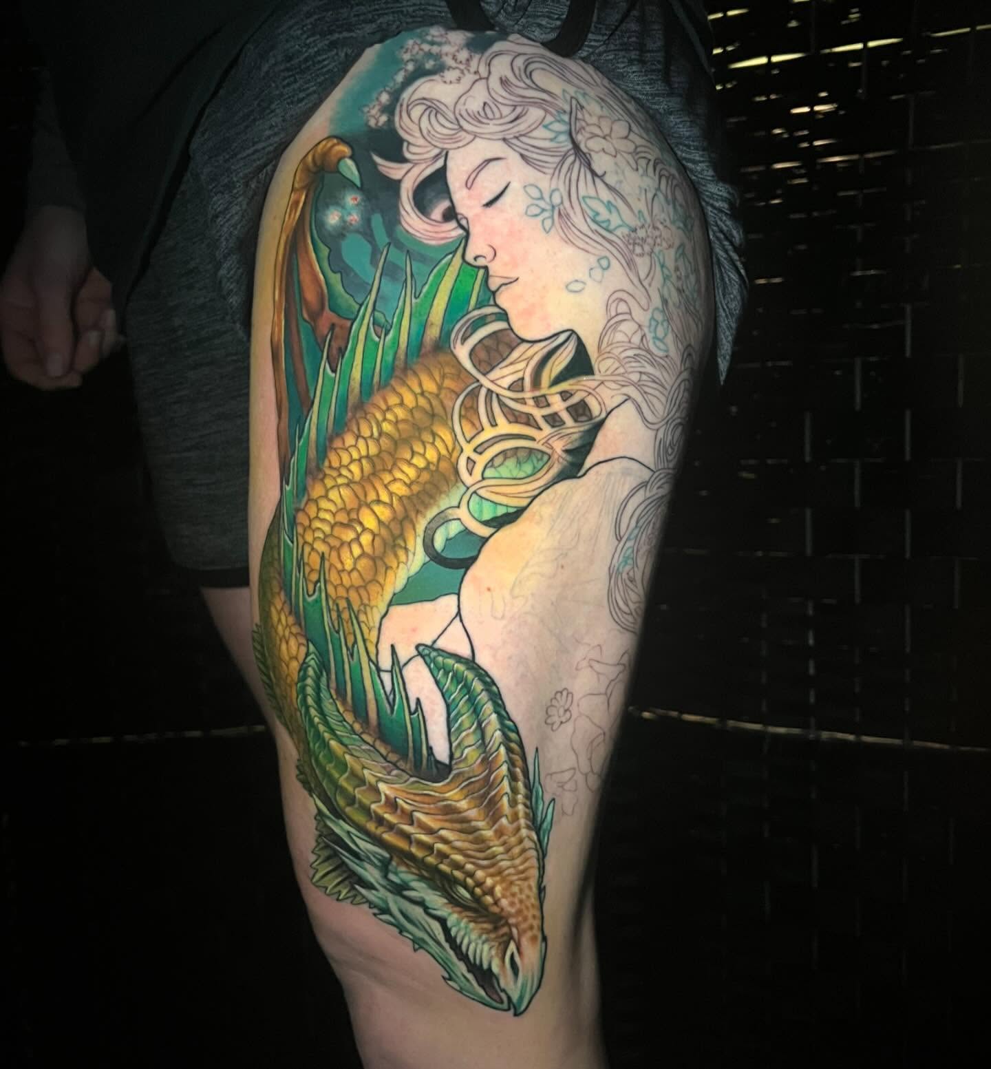 Mermaid and dragon illustrative tattoo on the thigh by Mary Blake Tattoos, Franklin, Tennessee