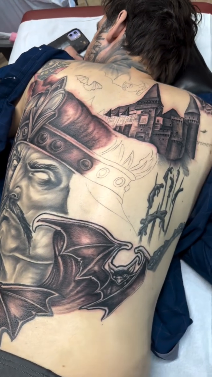 Gothic castle and knight's helmet dark realism tattoo by Nick Harrison, Dayton, Ohio
