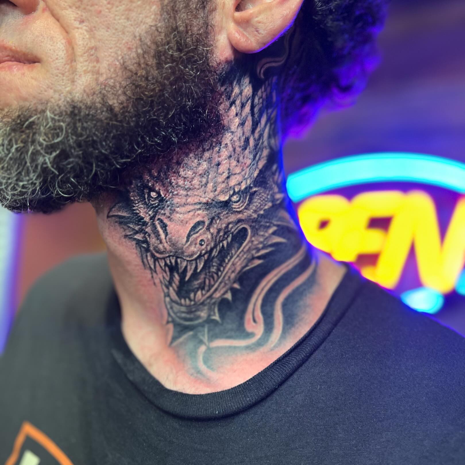 Dragon head realism tattoo on the neck by Summer Rain