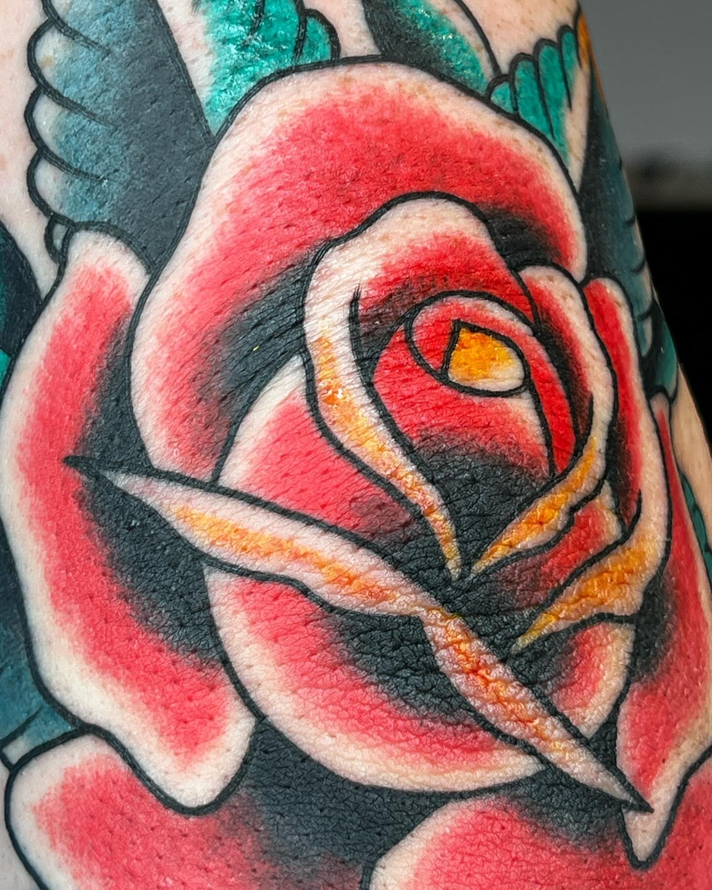 Rose American traditional tattoo on the forearm by Cory Miller