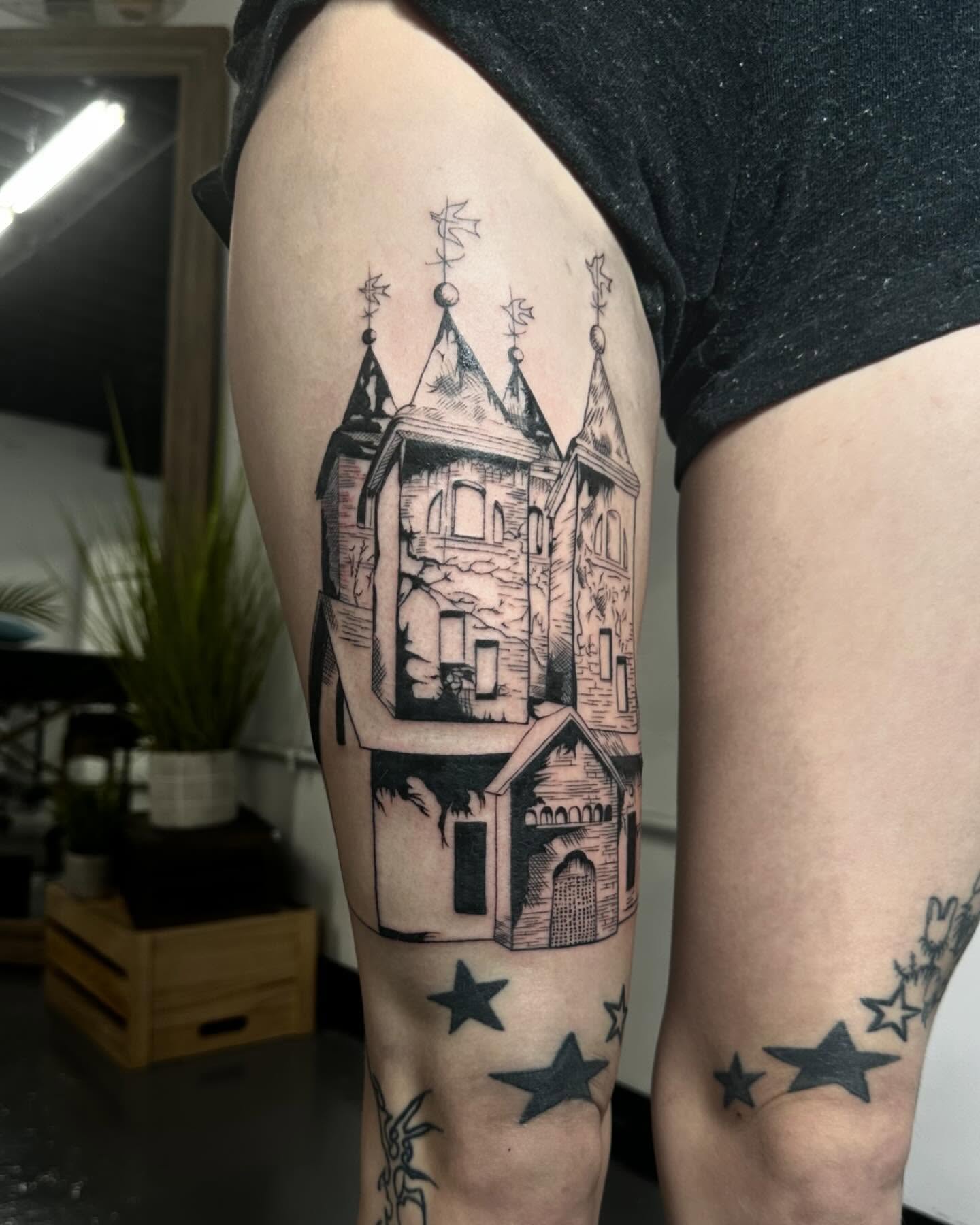 Castle black and grey tattoo on the thigh by chloe🗡️🖤🦇🩸