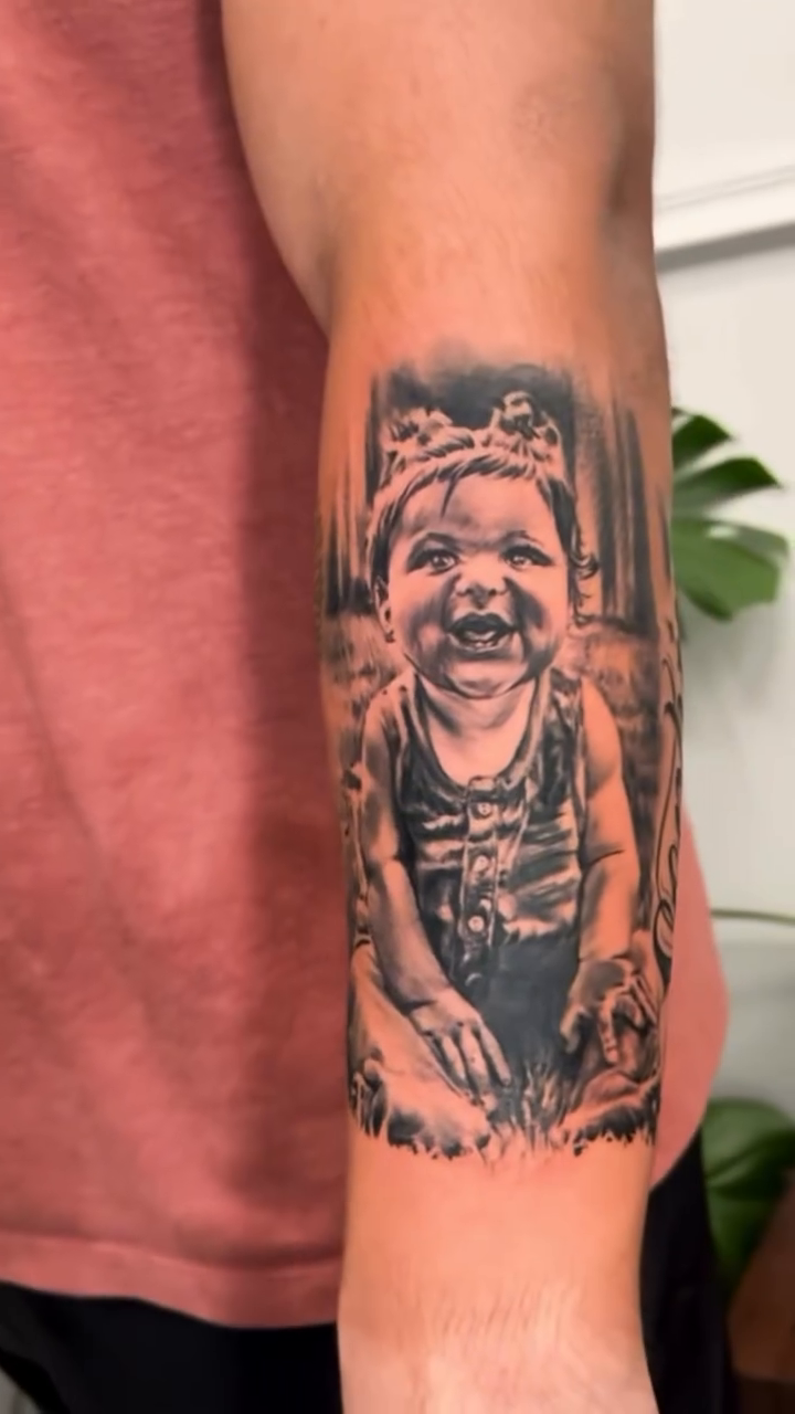 Baby portrait realism tattoo by Sloe Rivera
