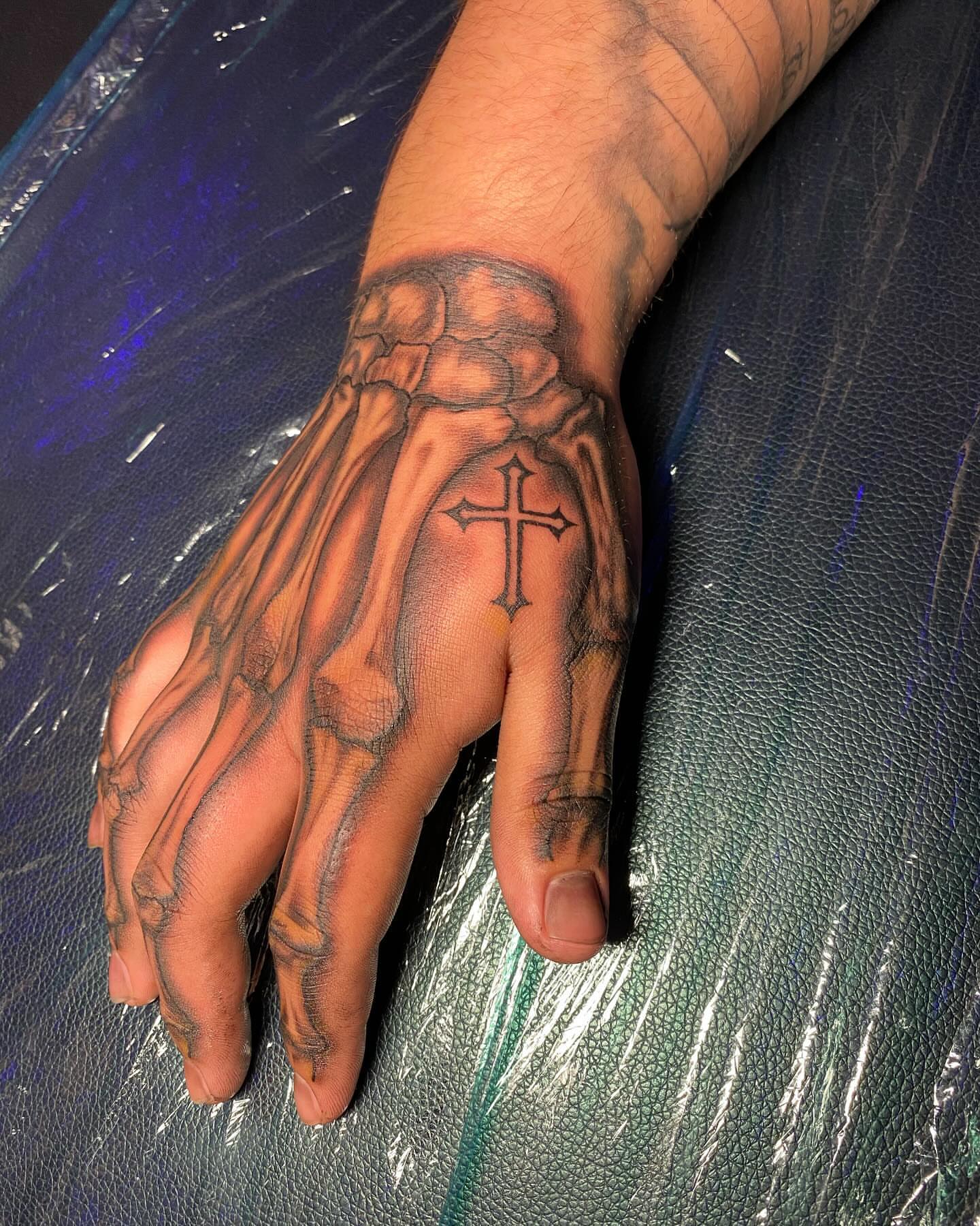 Skeleton hand realism tattoo on the hand by ππππππ
