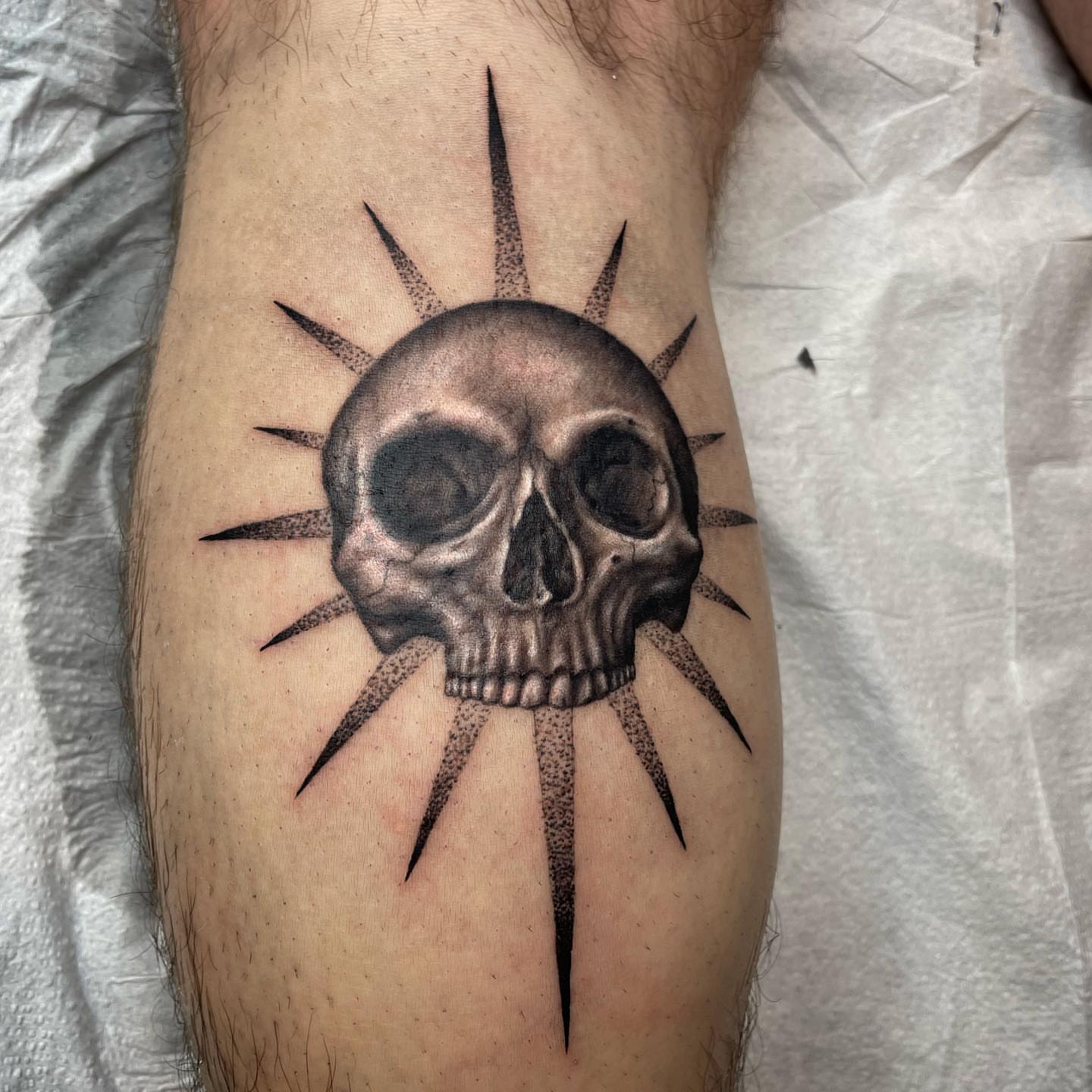 Skull dotwork tattoo on the forearm by Alexis Monkiewicz