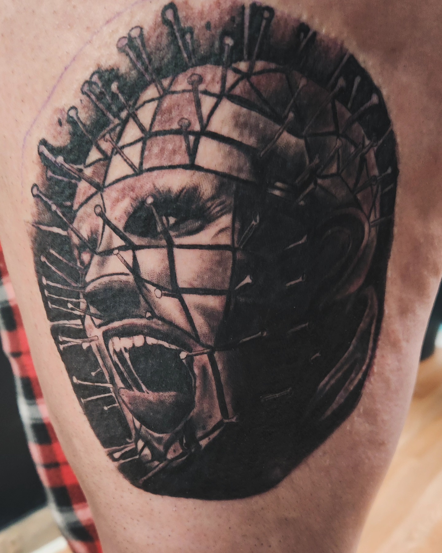 Tattoo by @goth_ross_502 — black_and_grey, realism