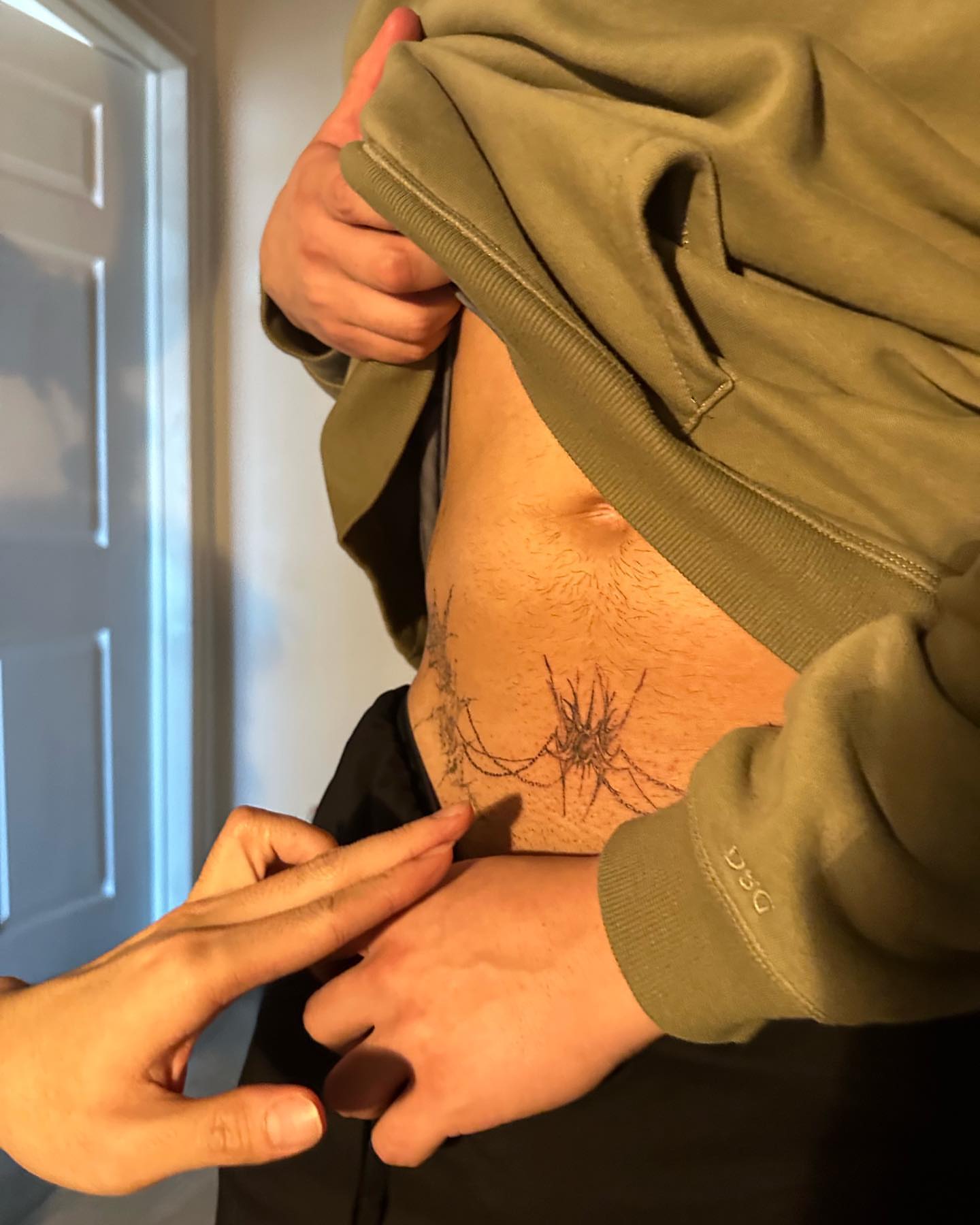 Spider geometric tattoo on the ribs by @taravychi