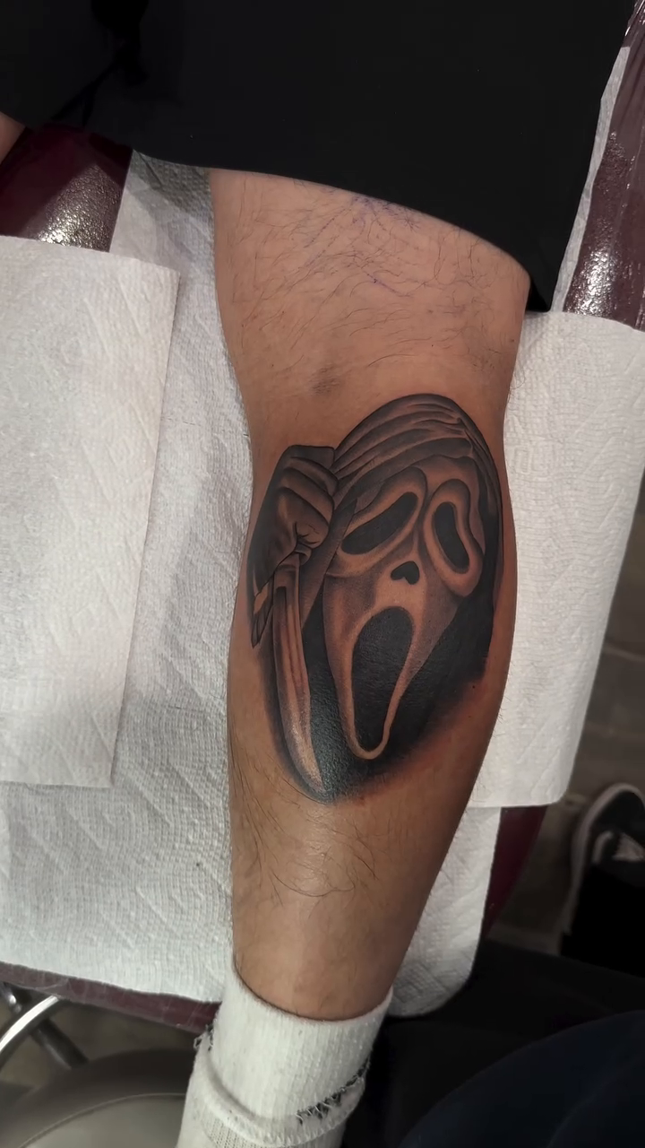 Ghostface mask realism tattoo by Cesar Nava