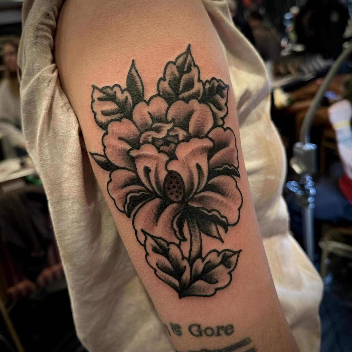 Peony American traditional tattoo on the forearm by Troy Mort, Altoona, Pennsylvania