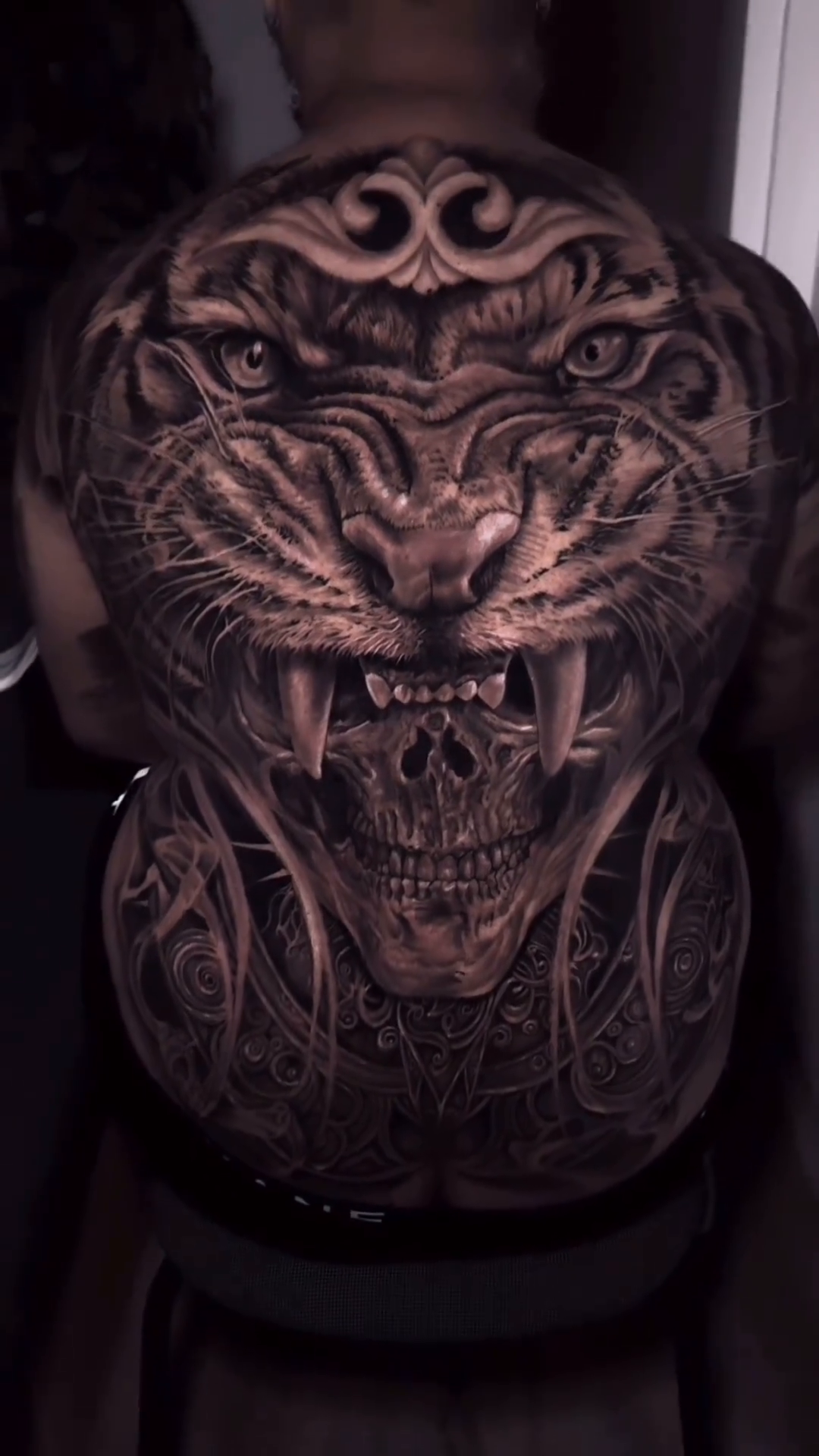 Tiger and skull dark realism tattoo by Pitasso tattoo black and grey