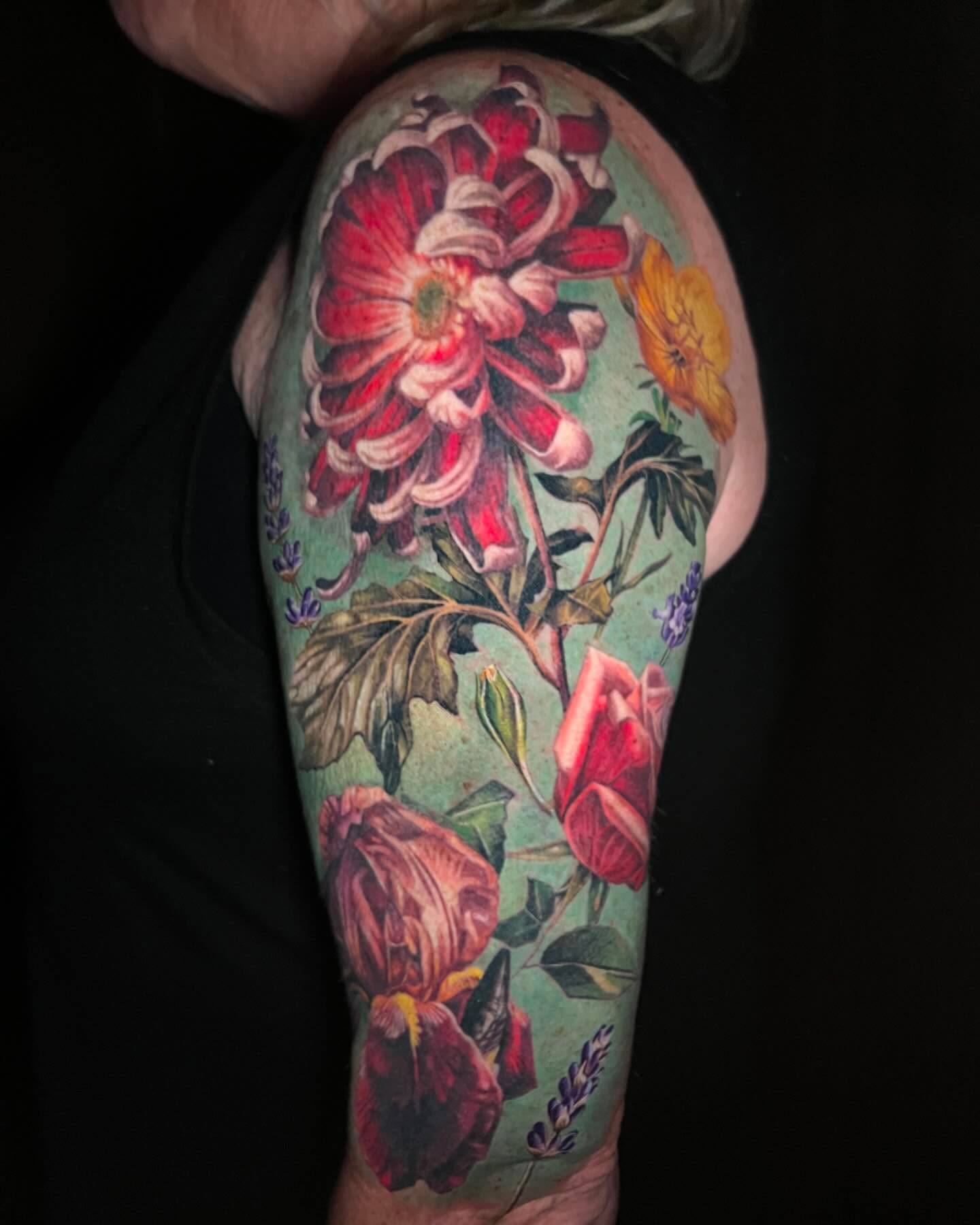 Floral bouquet realism tattoo on the forearm by Irina Shapiro, Somerville, Massachusetts