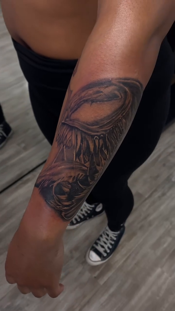 Venom face dark realism tattoo by Ryan Walker